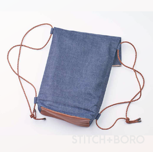 THE WEFT-  LEATHER CORD BACKPACK