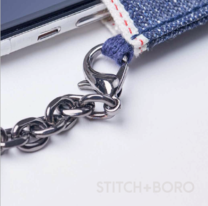 THE DERIVED PHONE POUCH WITH DETACHABLE CHAIN